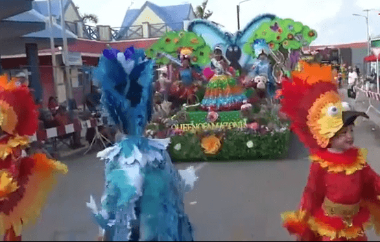 Aruba TV Plus - Colorful Aruba Carnival parade with elaborate bird costumes featured on ArubaTV