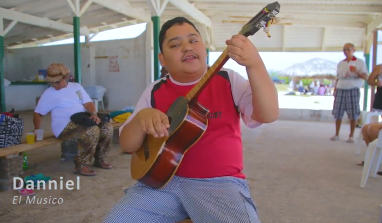 ArubaTV - Danniel El Musico young Aruban musician playing guitar on Aruba TV Plus